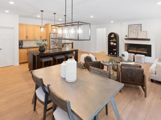 Thoughtfully designed main living area makes entertaining and everyday living easy. Photo shown is from a previously built home; selections and finishes may vary.