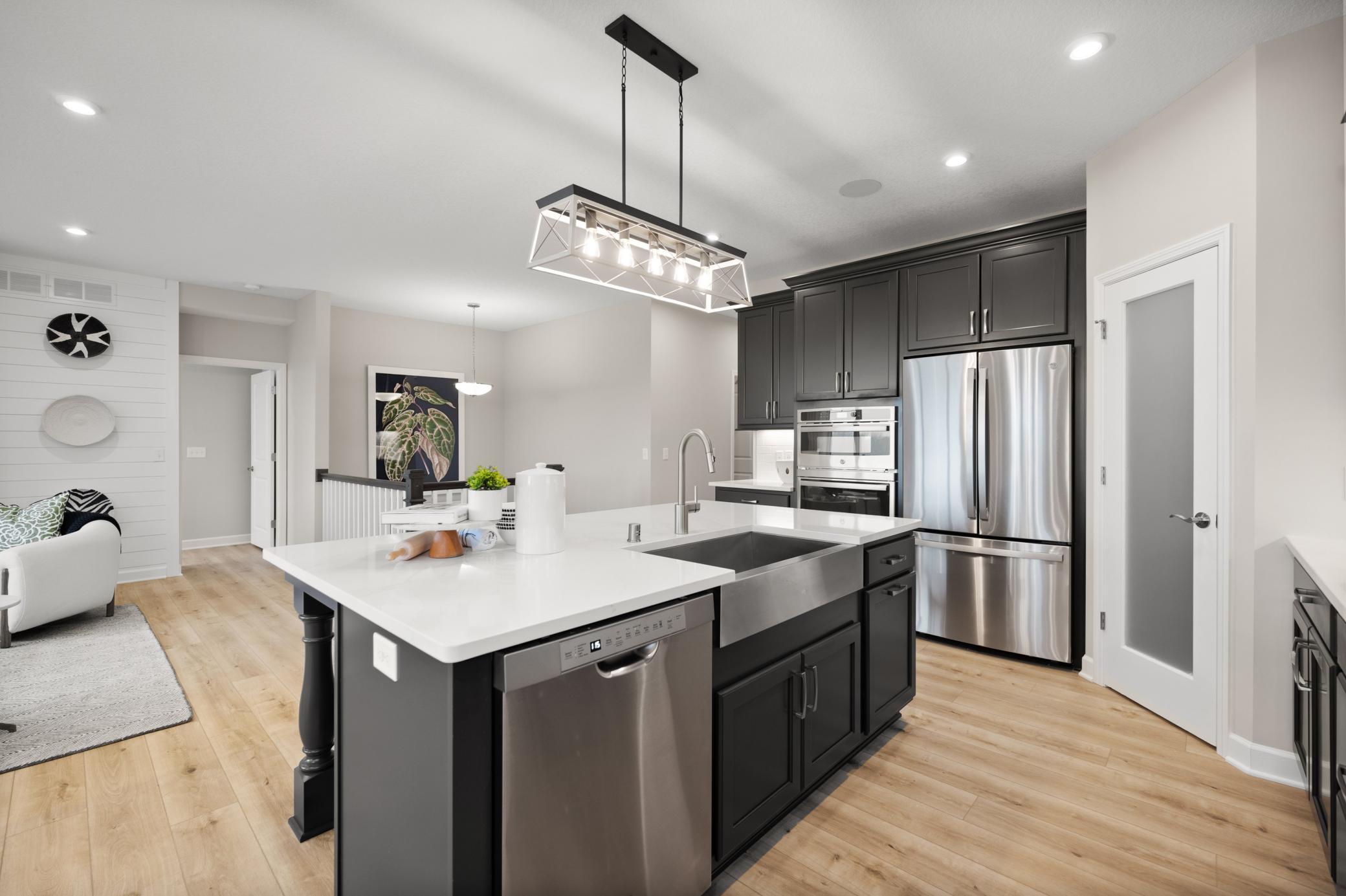 Alternate view of the spacious kitchen area. (model photo)