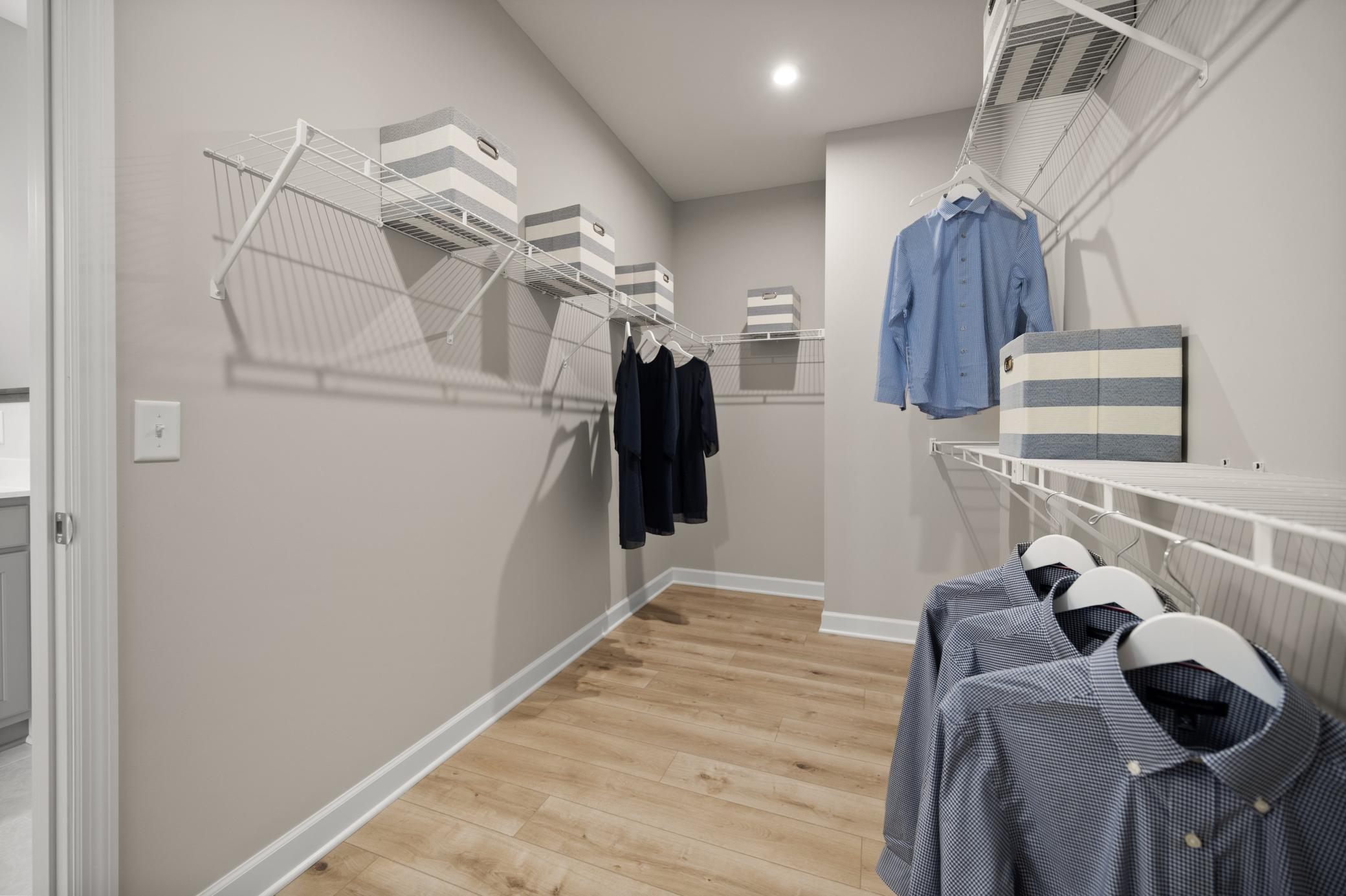 Without the space to stay organized it can be challenging but with the owner's walk in closet you will finally have all the space you need. (model photo)