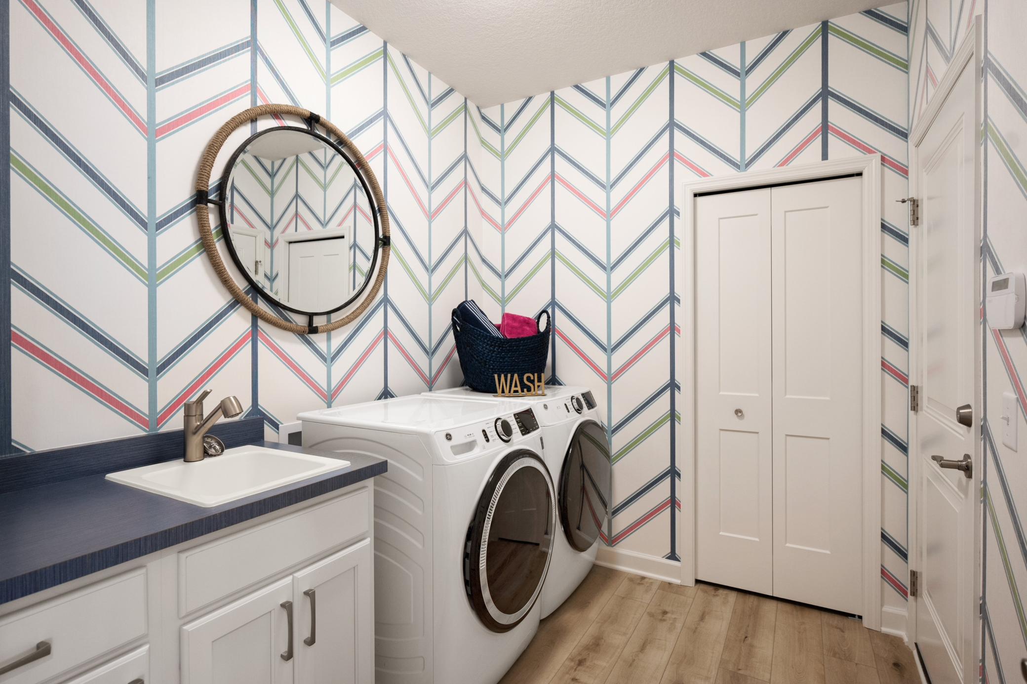 Main level laundry is essential with main level living. (model photo)