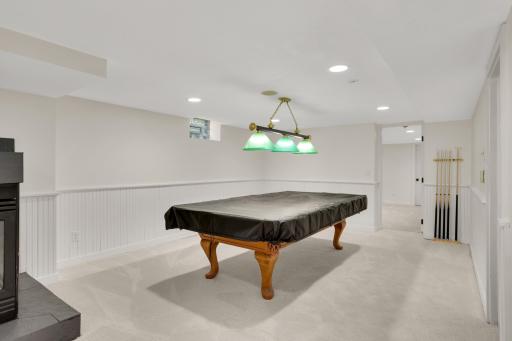 Lower Level great pool table with new sticks, balls etc