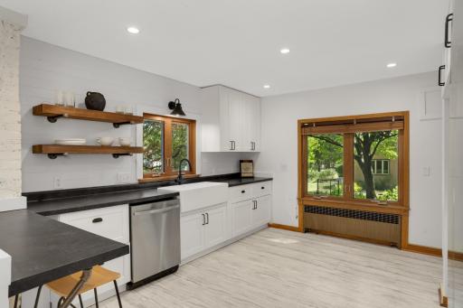 Beautifully renovated large Kitchen, all new appliances, soft close cabinetry, lighting, sink, counters and flooring.