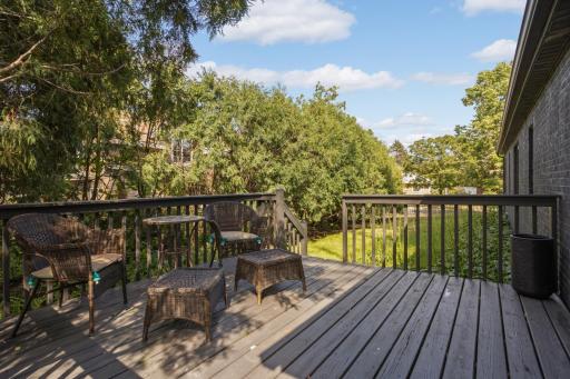 Lovely deck looking out to a quaint courtyard
