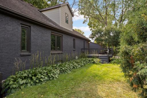 Courtyard with deck and side entrance to home