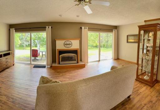 Large living room with view to private backyard