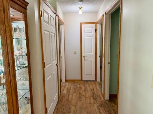 Hallway to guest bedrooms & guest bath on south end of house