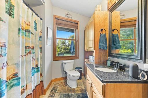 Main bath by garage and 3rd bdrm