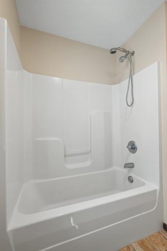Upper-Level Bath: Convenient full bathroom serving the upper-level bedrooms.