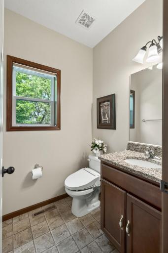 Main Floor Half Bath: Convenient main-level half bath perfect for guests.