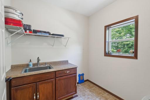 Mudroom: Convenient mudroom with washer and dryer hookups ready for installation (optional second laundry room).