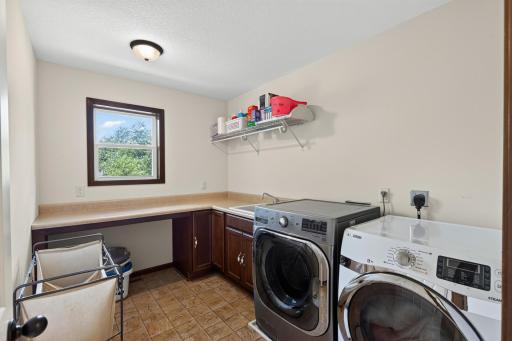 Laundry Room: Large upper-level laundry room offering excellent space and convenience.