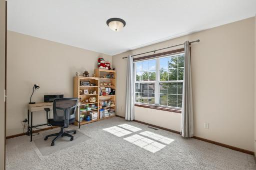Bedroom 3: Comfortable upper-level bedroom offering flexibility for family, guests, or a home office.