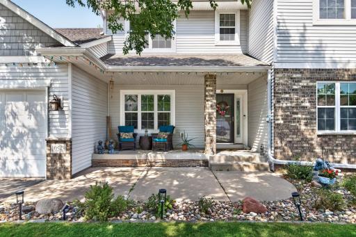 Front Exterior: Beautiful curb appeal with a welcoming front entry and well-maintained landscaping.