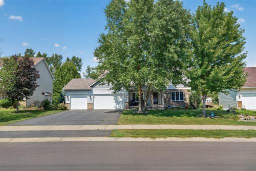 Front Exterior: Beautiful curb appeal with a welcoming front entry and well-maintained landscaping.