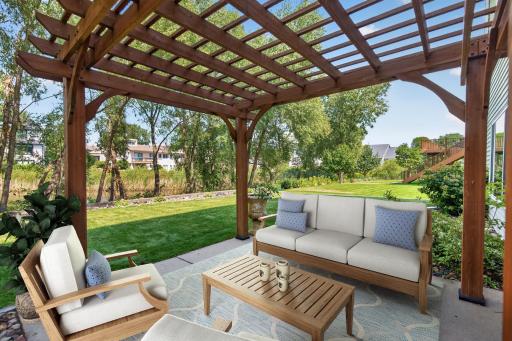 Patio: Spacious patio overlooking the pond, perfect for relaxing or entertaining.