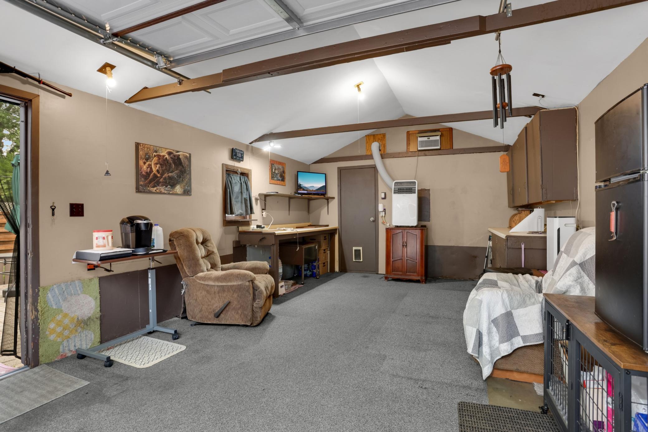 The garage has heat and AC. It's been used as an office and has an attached storeage room