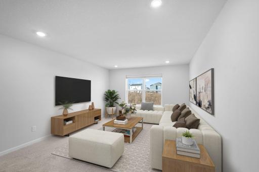 This spacious, sundrenched loft greets you at the top of the stairs! Plenty of room for a 2nd living room! Photos are for representational purposes. Styles, colors and selections may vary.