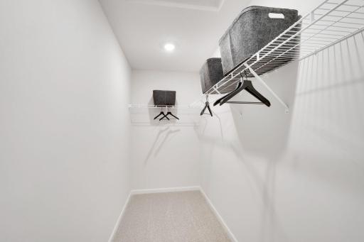 Oversized Primary Closet! Photos are for representational purposes. Styles, colors and selections may vary.