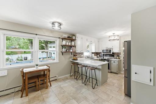 An open connection between the kitchen and dining area keeps everyone part of the conversation.