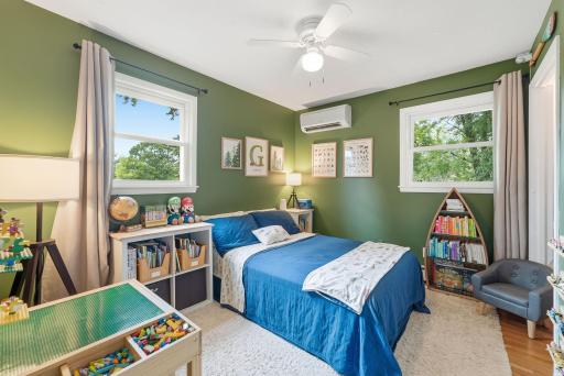 One of four bedrooms, offering flexibility for sleeping, working, studying or creative space.