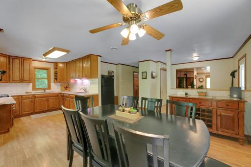 Spacious Kitchen/Dining Area. Room to gather Family and Friends. Ceiling fan has been replaced.
