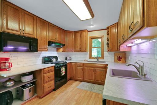 Refreshed kitchen with new countertops. Notice 2 sinks. Handy with a crowd.