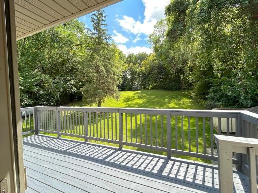 Freshly stained Deck overlooking spectacular back yard