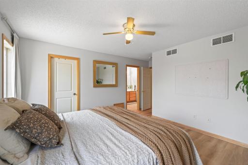 Primary bedroom with walk-through bathroom