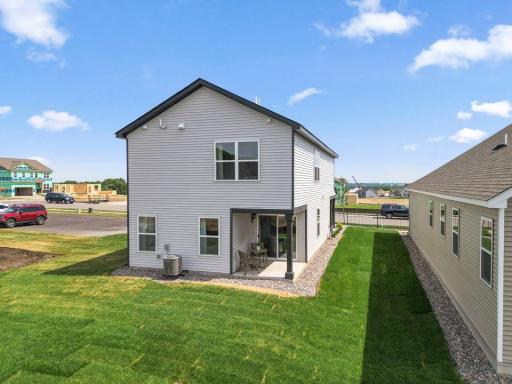 Check out that covered patio! An example of a completed Ferguson. Color and finishes may vary.