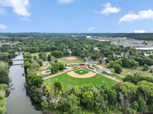 Dundas' Memorial Stadium is tucked in the trees near the Cannon River.