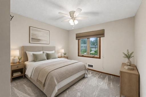 2nd bedroom on the main level (virtually staged).