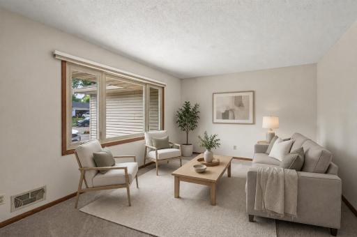 Virtually staged, sun filled formal living room.