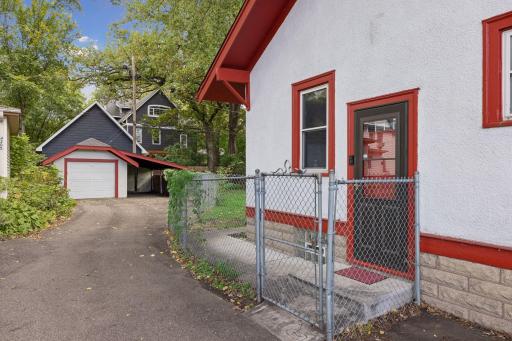 Side door leads to a walkway and the driveway.