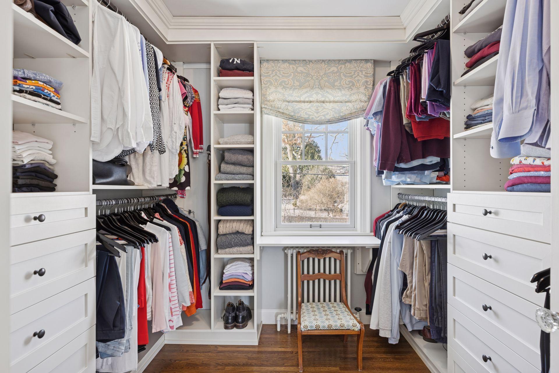Generous walk-in closet with ample storage.