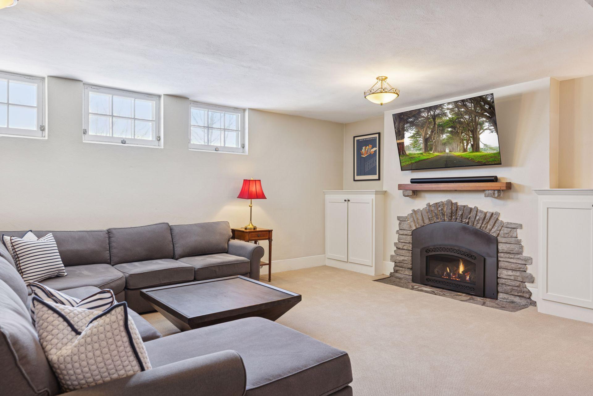 An expansive lower-level retreat designed for entertaining.
