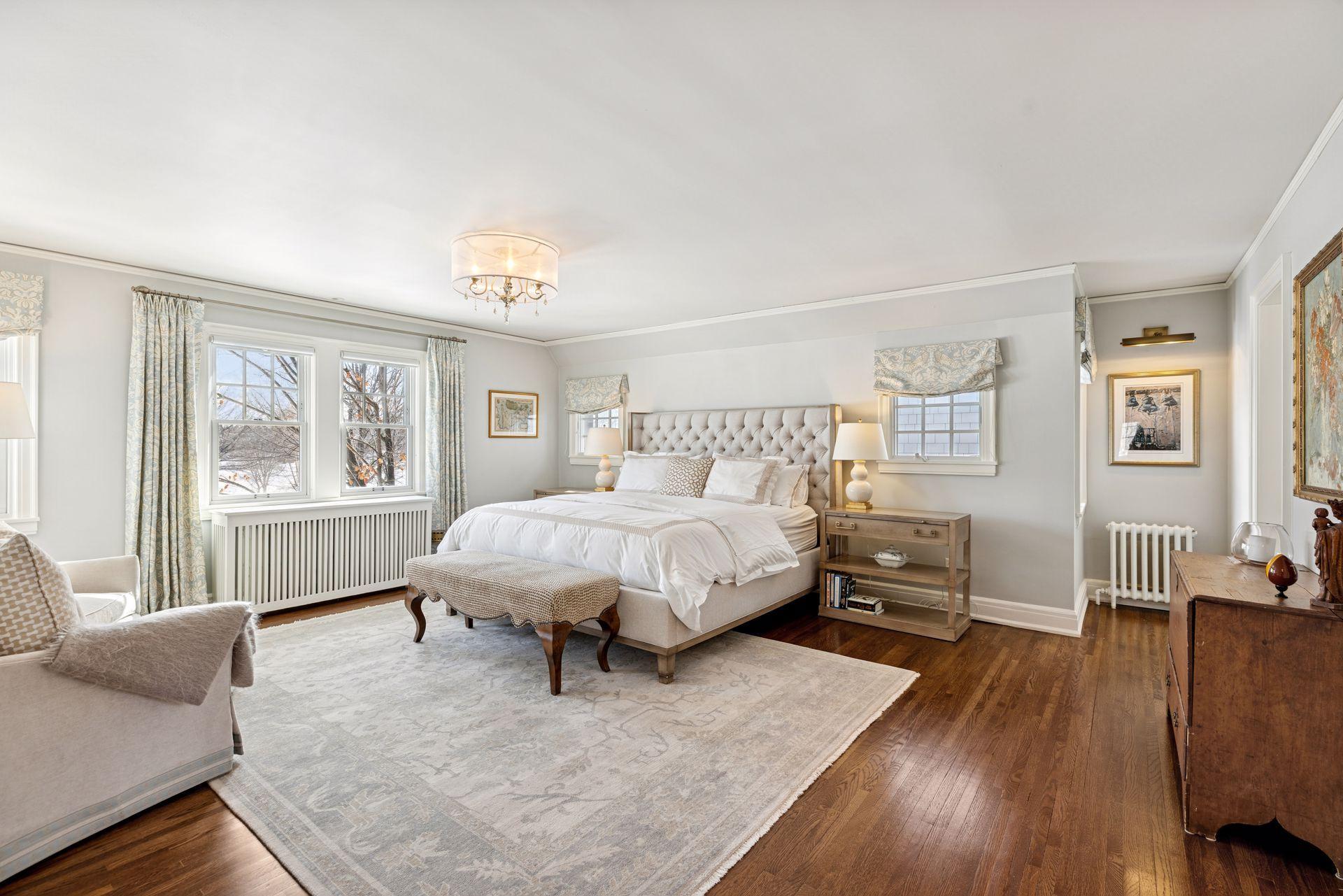 A spacious primary retreat designed for relaxation.