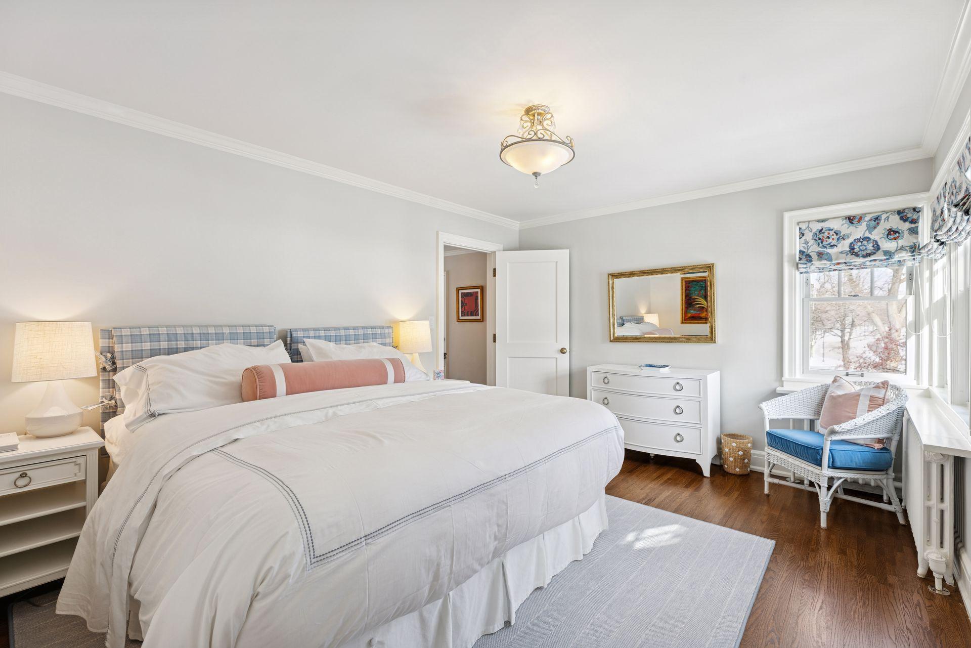 Comfortable and inviting 3rd bedroom with great natural light.