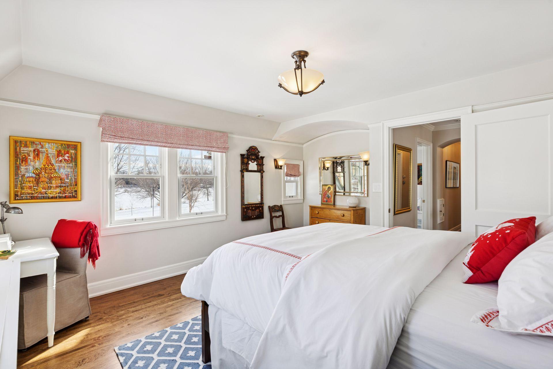 Bright and inviting, this east-facing fourth bedroom offers a peaceful retreat with a charming nook for work or study.