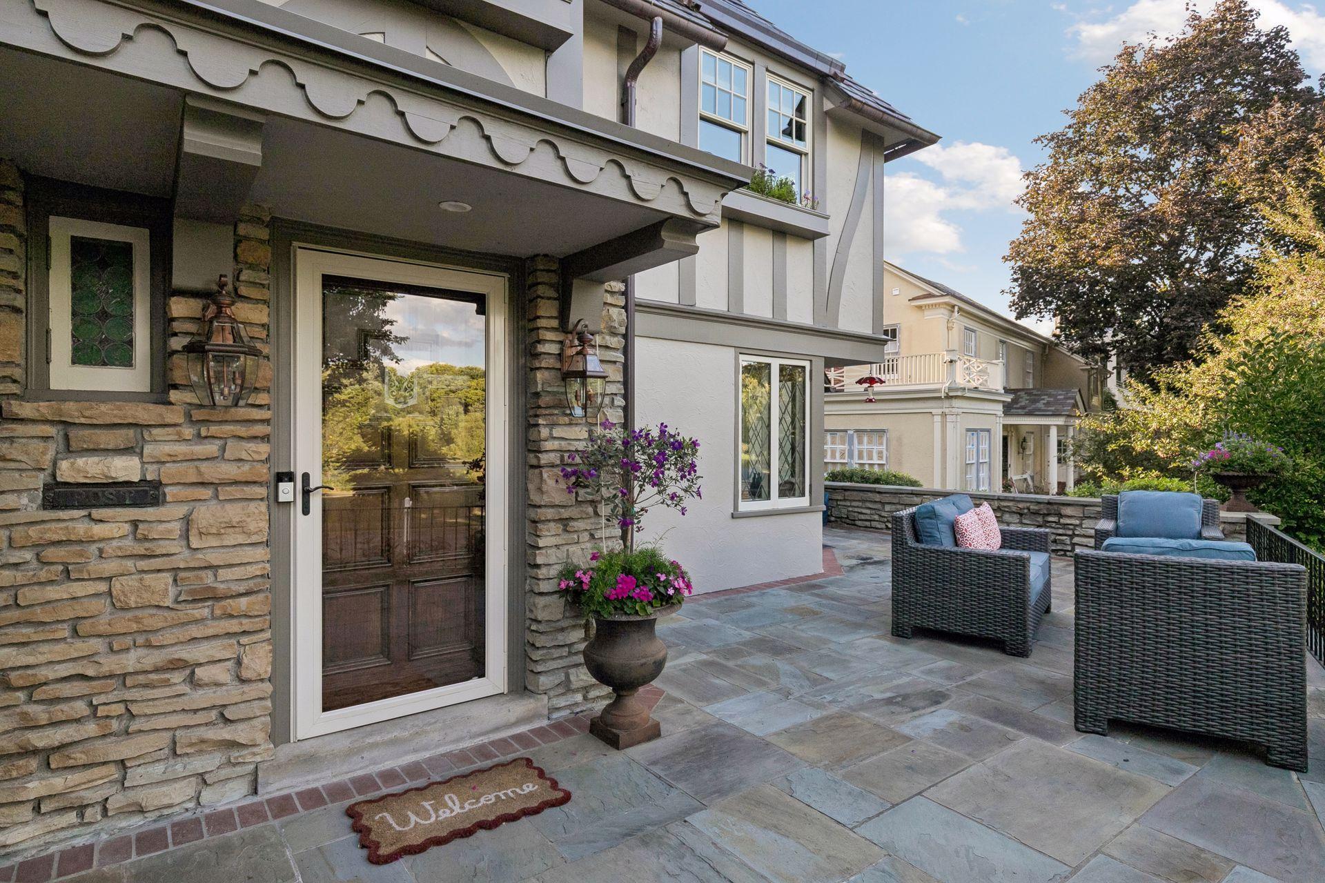 A rare combination of privacy and connection—the elevated front patio overlooks the parkway while remaining tucked into the surrounding landscape.
