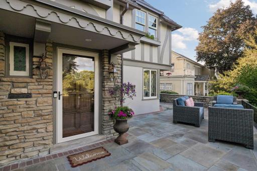 A rare combination of privacy and connectionâthe elevated front patio overlooks the parkway while remaining tucked into the surrounding landscape.