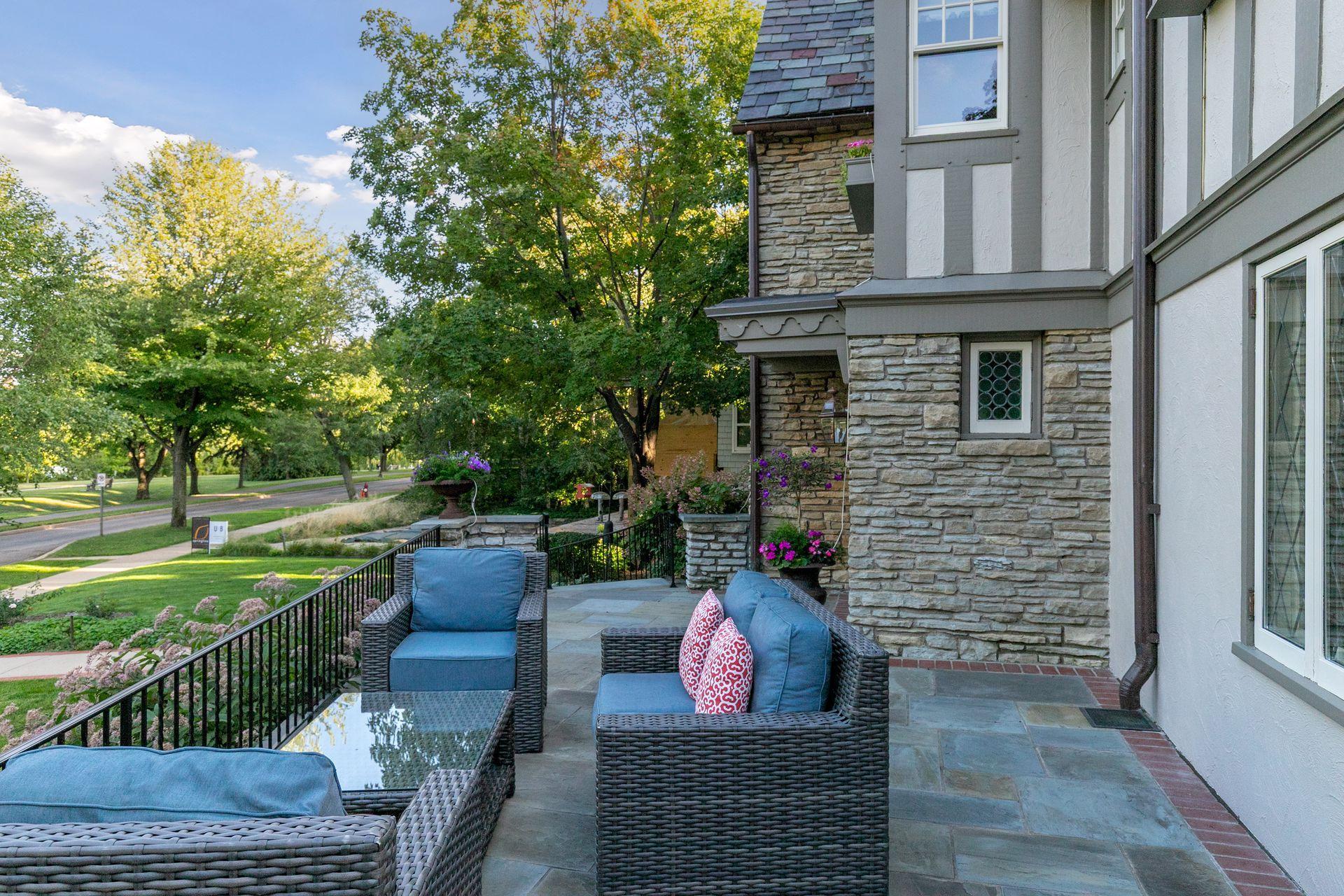 One of the coolest front patios in the city—an elevated outdoor living space overlooking Lake of the Isles and the parkway.