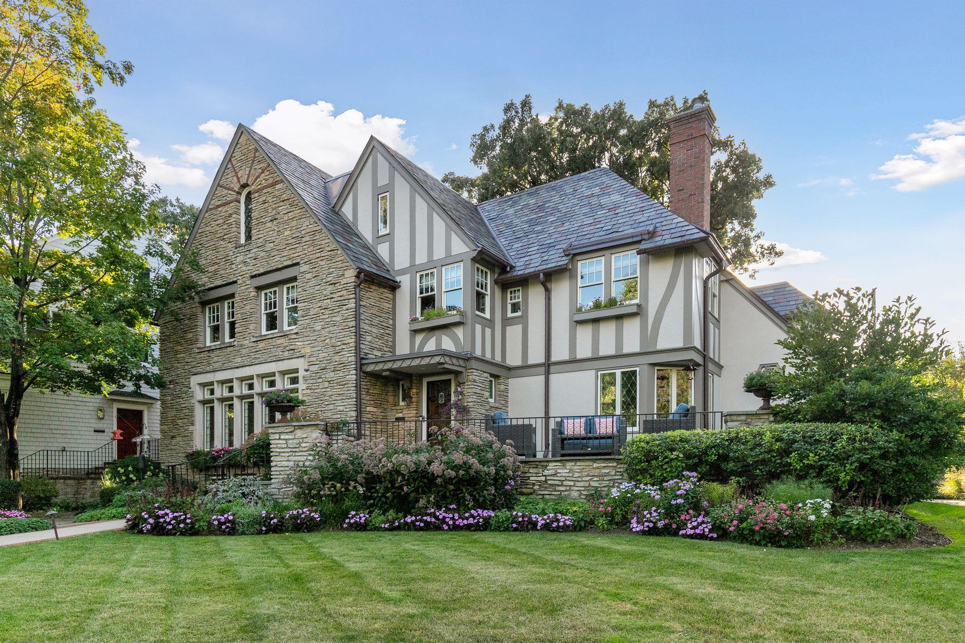Exceptional curb appeal, with lush gardens, mature trees and timeless stone detailing creating a remarkable sense of arrival.
