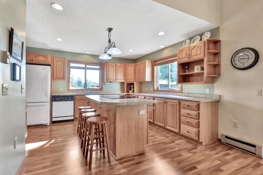 Additional view of the kitchen with ample cupboard and counter space.