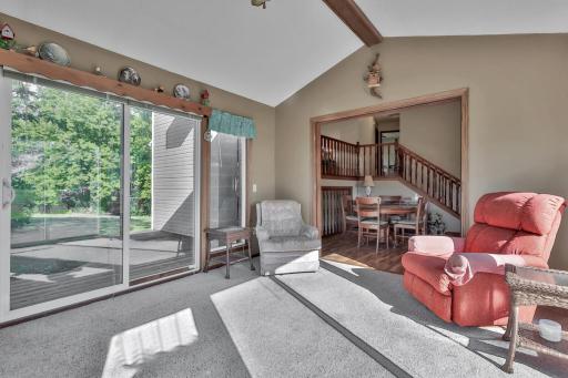 Vaulted 4 season room with patio doors to deck.