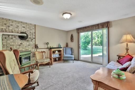 Walk out lower level to patio and back yard. Mature trees for exceptional privacy.