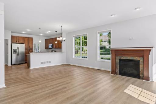 The living room and dining room are open and flowing with 9' ceilings.