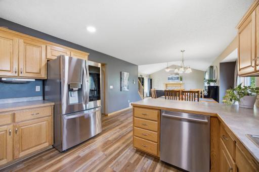 The kitchen shines with stainless steel appliances and outstanding countertop and cabinet space!