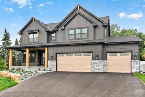 Despite the 3 car opening, it is a 4 car garage!