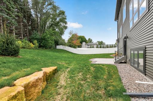 Rear exterior with a patio and maintenance free deck steps.