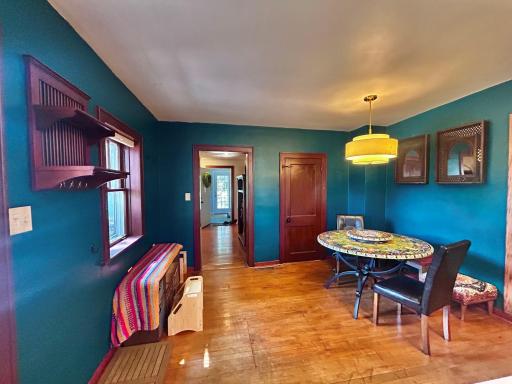Looking at the dining area from the kitchen. Straight ahead is the entryway, front door then the four season porch.